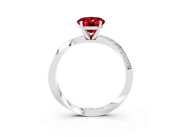 White gold Oval Cut Ruby Engagement Ring with Side Stone Accents and Four-Prong Setting