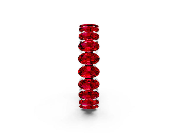 White gold Oval Cut Ruby Eternity Band with Shared Prong Setting