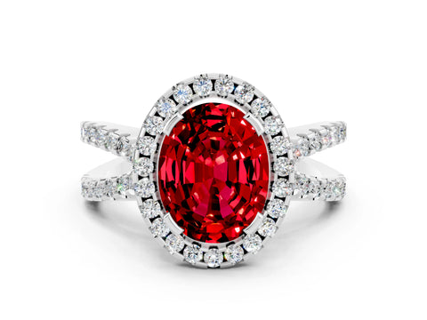 White gold Oval Cut Ruby Halo Ring with Split Shank Pavé Band and Prong Setting