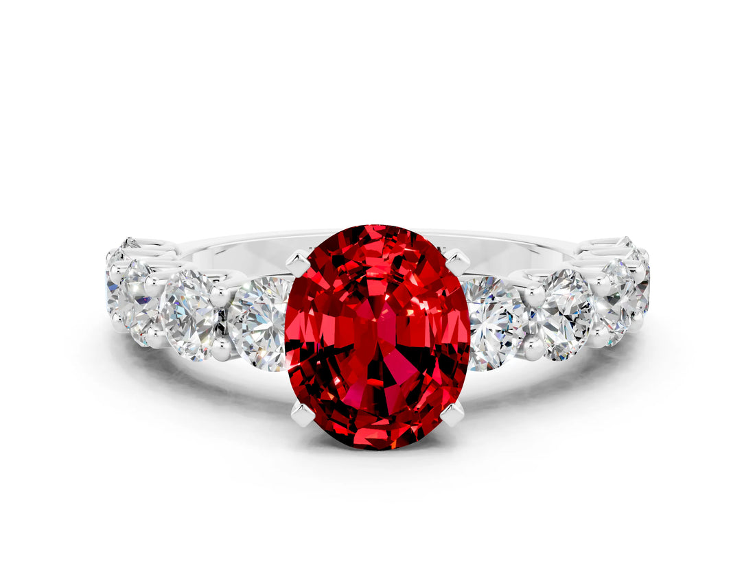 White gold Oval Cut Ruby Prong Setting with Side Stones on a Pave Band