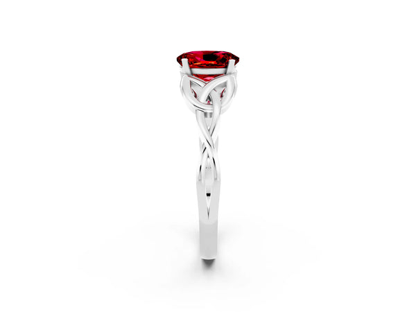 Silver Oval Cut Ruby Solitaire Celtic Knot Ring with Four-Prong Setting