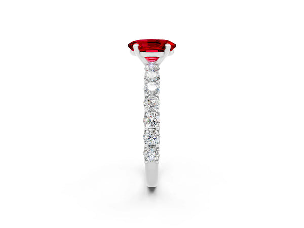 Silver Oval Cut Ruby Solitaire Ring with Shared Prong Pavé Band and Four-Prong Setting