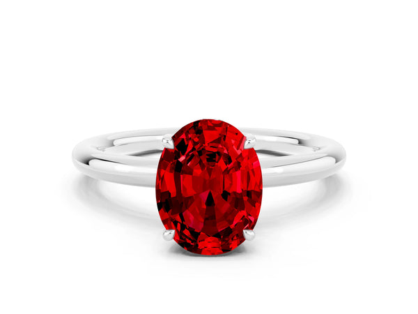 Platinum Oval Cut Ruby Solitaire Ring with Thin Band and Four-Prong Setting