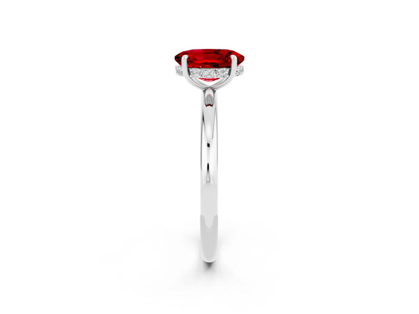 Platinum Oval Cut Ruby Solitaire Ring with Thin Band and Four-Prong Setting