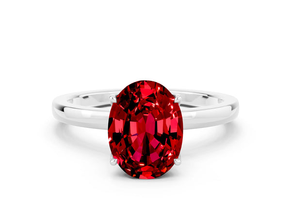 Platinum Oval Cut Ruby Solitaire Ring with Thin Band and Prong Setting