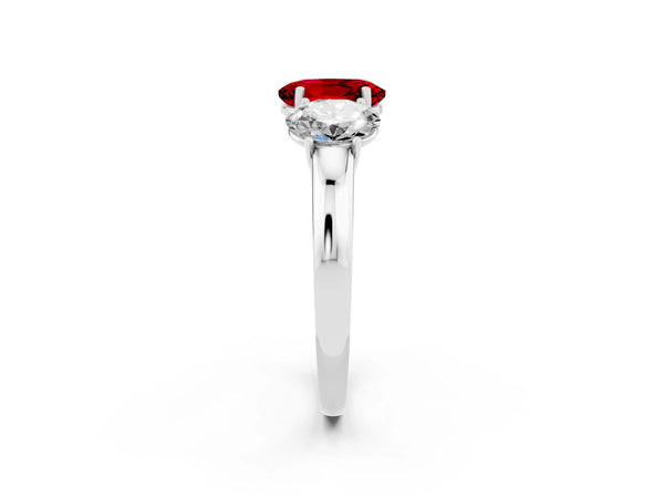 White gold Oval Cut Ruby Three-Stone Ring with Four-Prong Setting and Classic Band
