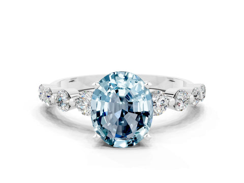 White gold Oval Cut Solitaire Aquamarine Ring with Pave Band and Four-Prong Setting