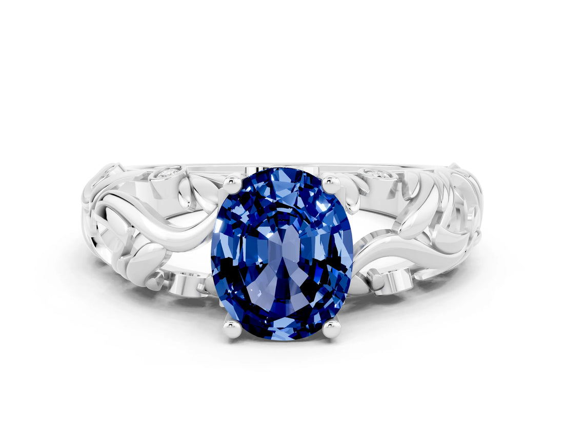 White gold Oval Cut Solitaire Blue Sapphire Leaf-Inspired Vine Band Ring with Prong Setting