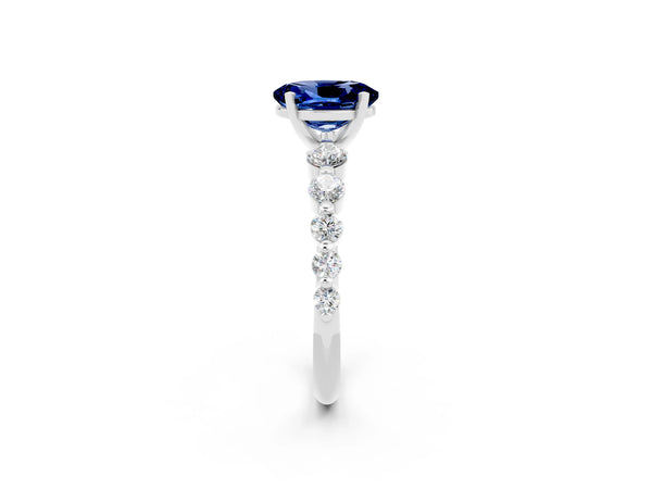 Silver Oval Cut Solitaire Blue Sapphire Ring with Pave Band and Four-Prong Setting