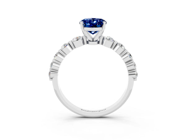 Silver Oval Cut Solitaire Blue Sapphire Ring with Pave Band and Four-Prong Setting