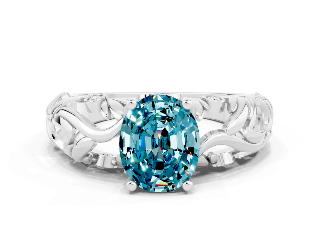 White gold Oval Cut Solitaire Blue Topaz Leaf-Inspired Vine Band Ring with Prong Setting