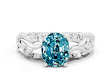 White gold Oval Cut Solitaire Blue Topaz Leaf-Inspired Vine Band Ring with Prong Setting