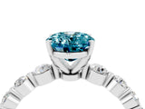 White gold Oval Cut Solitaire Blue Topaz Ring with Pave Band and Four-Prong Setting_4
