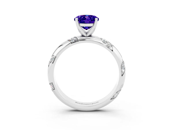 Platinum Oval Cut Tanzanite Solitaire Engagement Ring with Twisted Round  Accent Band and Prong Setting
