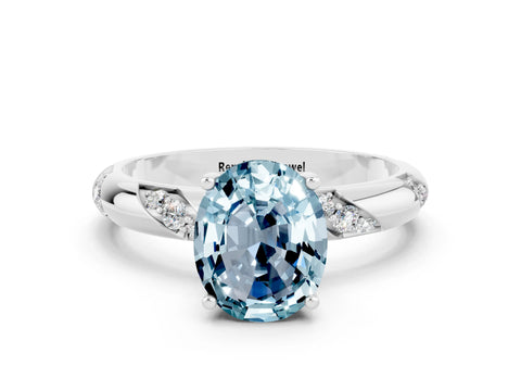 White gold Oval Cut Solitaire Diamond Engagement Ring with Twisted Pave Band and Four-Prong Setting
