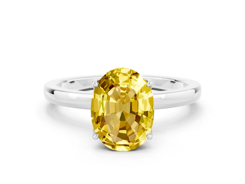 White gold Oval Cut Solitaire Diamond Ring with Thin Band and Four-Prong Setting