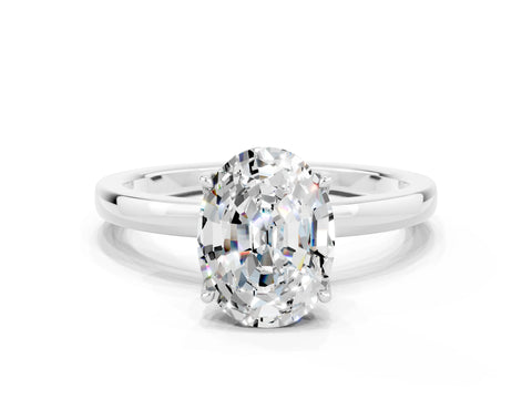 White gold Oval Cut Solitaire Diamond Ring with Thin Band and Four-Prong Setting