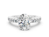 White gold Oval Cut Solitaire Diamond with Pavé Band and Four-Prong Setting