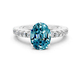White gold Oval Cut Solitaire Diamond with Pavé Band and Four-Prong Setting