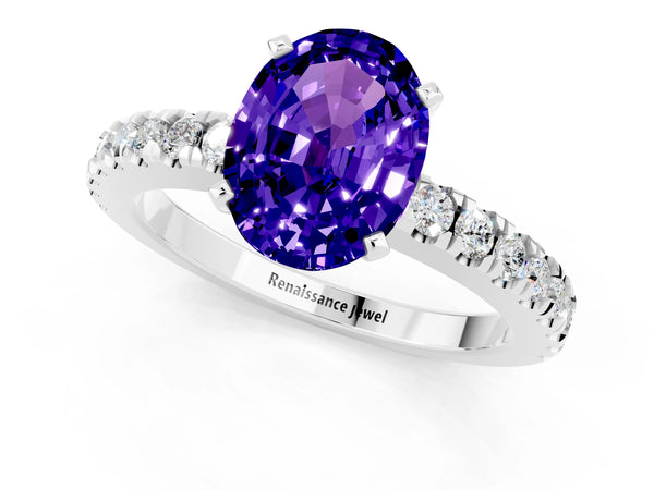 Platinum Oval Cut Solitaire Tanzanite with Pavé Band and Four-Prong Setting