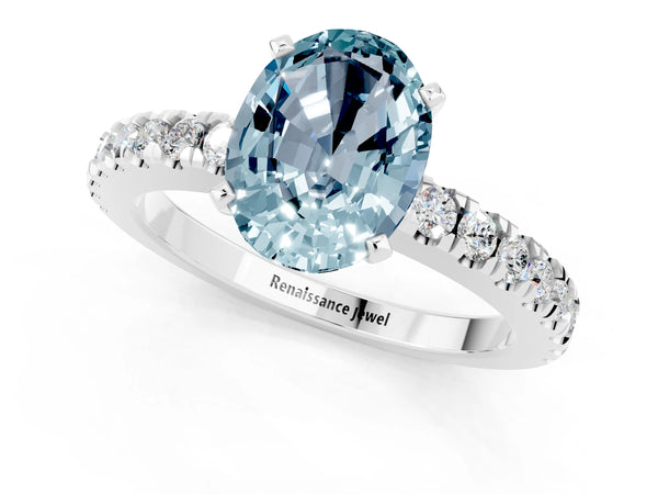 Silver Oval Cut Solitaire Aquamarine with Pavé Band and Four-Prong Setting