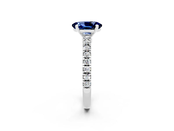 Silver Oval Cut Solitaire Blue Sapphire with Pavé Band and Four-Prong Setting