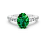 White gold Oval Cut Solitaire Diamond with Pavé Band and Four-Prong Setting