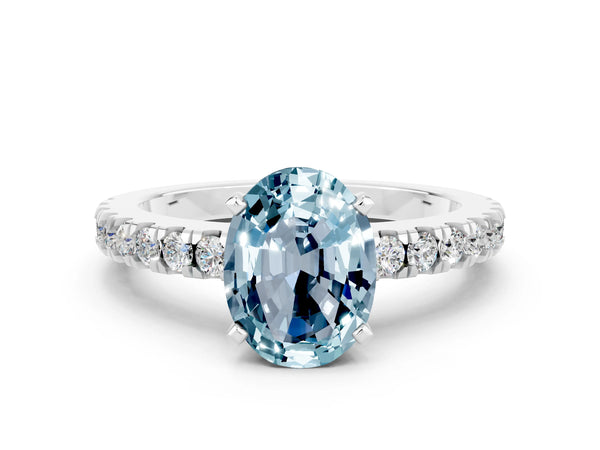 Silver Oval Cut Solitaire Aquamarine with Pavé Band and Four-Prong Setting