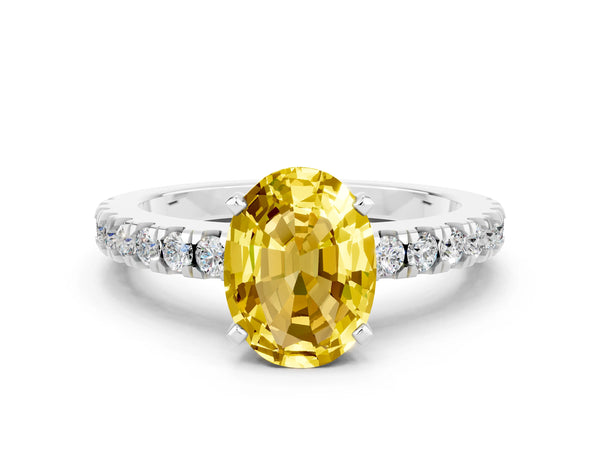 White gold Oval Cut Solitaire Yellow Sapphire with Pavé Band and Four-Prong Setting