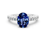 White gold Oval Cut Solitaire Diamond with Pavé Band and Four-Prong Setting
