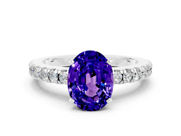 Platinum Oval Cut Solitaire Tanzanite with Pavé Band and Four-Prong Setting