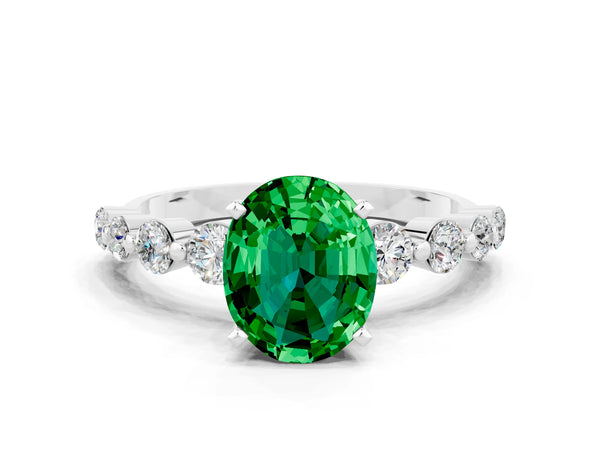Platinum Oval Cut Solitaire Emerald Ring with Pave Band and Four-Prong Setting
