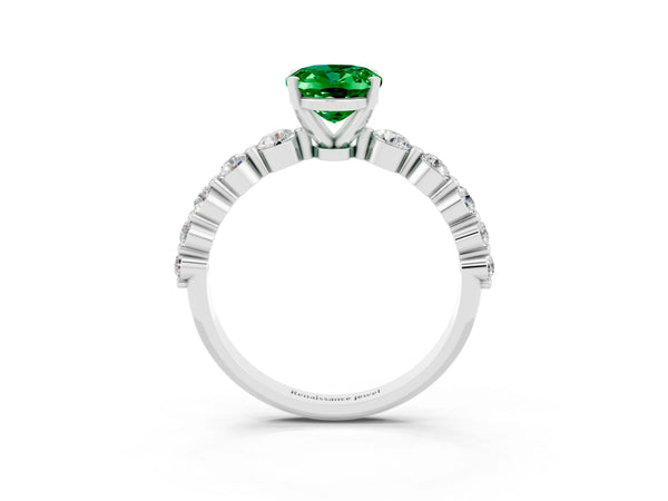 Platinum Oval Cut Solitaire Emerald Ring with Pave Band and Four-Prong Setting