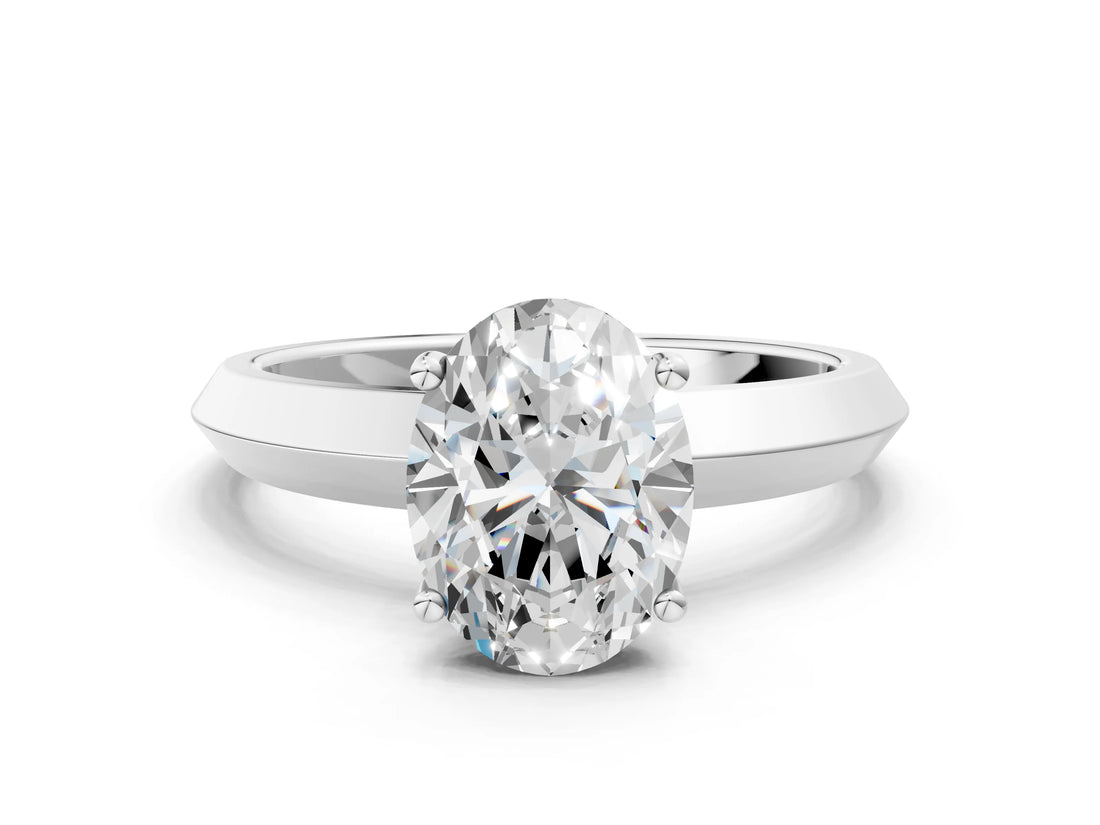 White gold Oval Cut Solitaire Engagement Ring with Flat Band and Four-Prong Setting