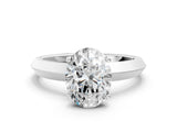 White gold Oval Cut Solitaire Engagement Ring with Flat Band and Four-Prong Setting