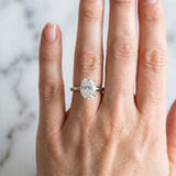Silver 1.50 Carat F VS1 Oval Cut Solitaire Engagement Ring with Four-Prong Setting and Classic Band