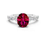 White gold Oval Cut Solitaire Garnet Ring with Pave Band and Four-Prong Setting