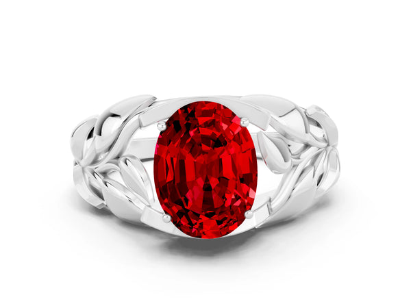 Silver Oval Cut Ruby Leaf-Inspired Engagement Ring with Round Accents and Prong Setting