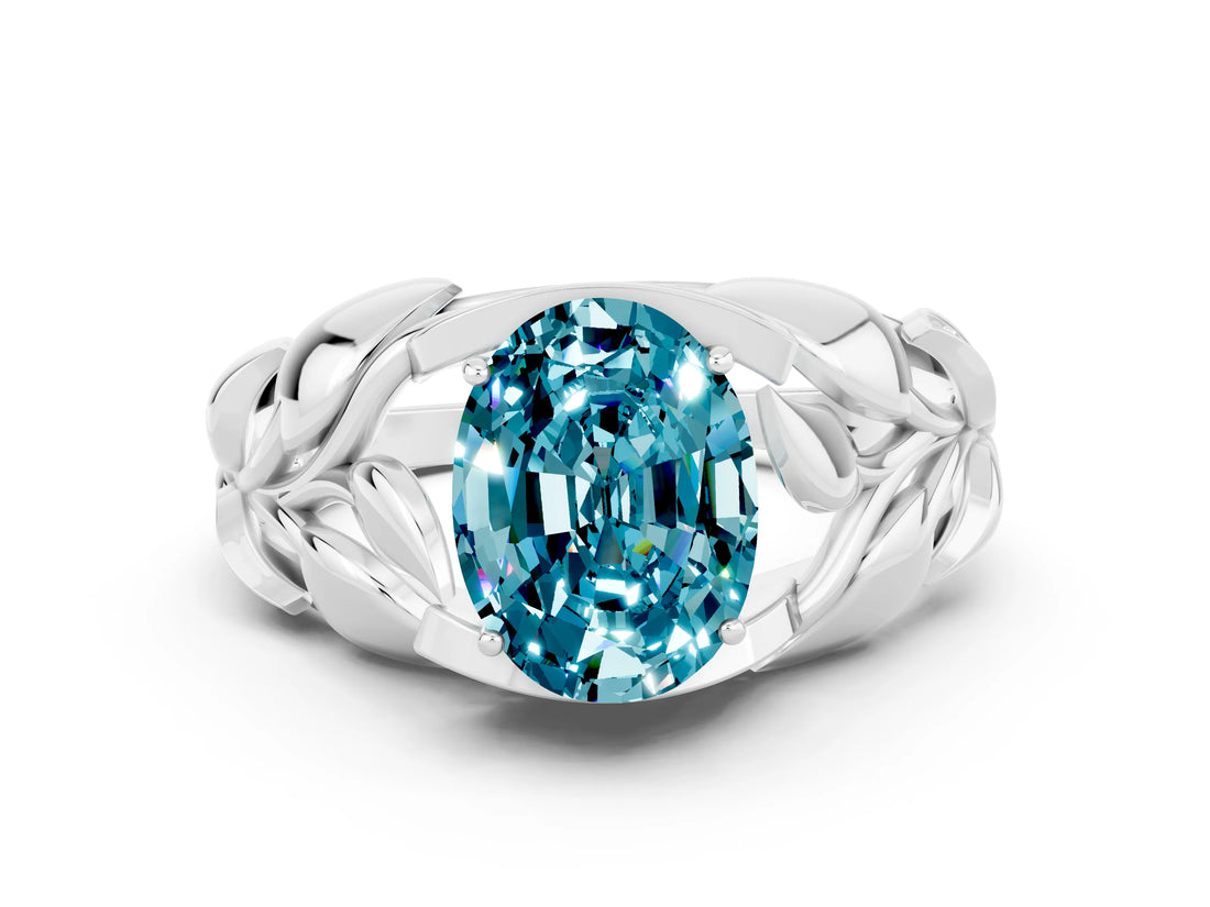 White gold Oval Cut Solitaire Leaf-Inspired Engagement Ring with Prong Setting
