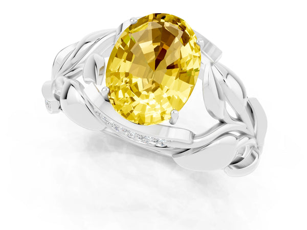 White gold Oval Cut Yellow Sapphire Leaf-Inspired Engagement Ring with Round Accents and Prong Setting