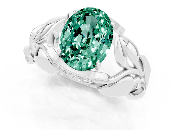 Silver Oval Cut Green Sapphire Leaf-Inspired Engagement Ring with Round Accents and Prong Setting