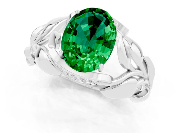 Silver Oval Cut Emerald Leaf-Inspired Engagement Ring with Round Accents and Prong Setting