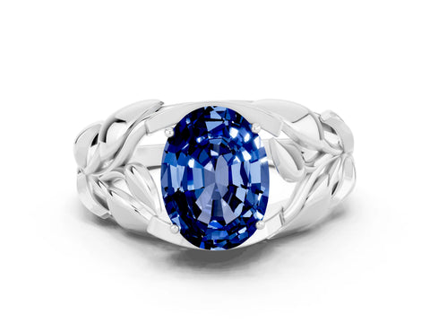 White gold Oval Cut Solitaire Leaf-Inspired Engagement Ring with Prong Setting