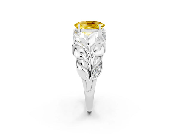 Silver Oval Cut Yellow Sapphire Leaf-Inspired Engagement Ring with Round Accents and Prong Setting