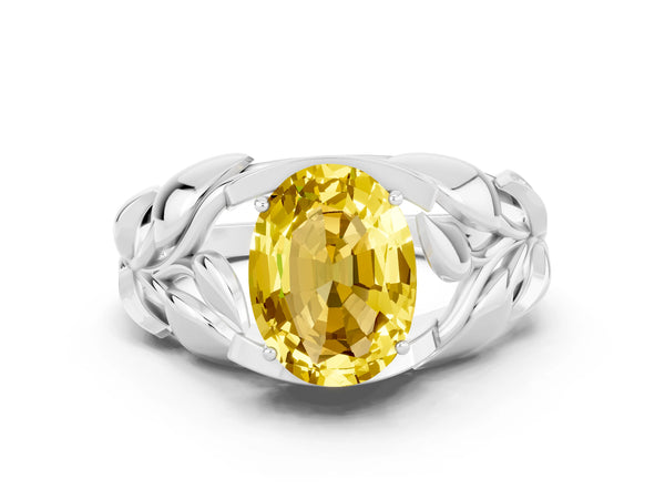 Silver Oval Cut Yellow Sapphire Leaf-Inspired Engagement Ring with Round Accents and Prong Setting