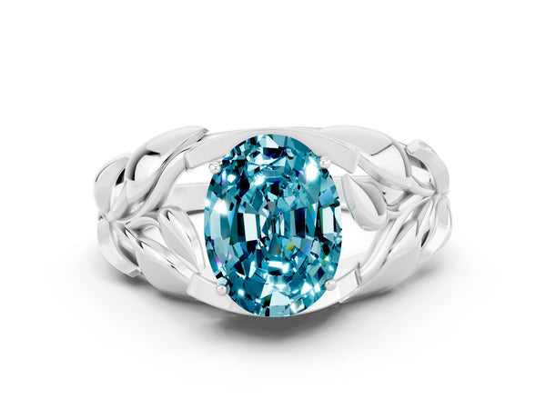 Silver Oval Cut Solitaire Leaf-Inspired Engagement Ring with Prong Setting
