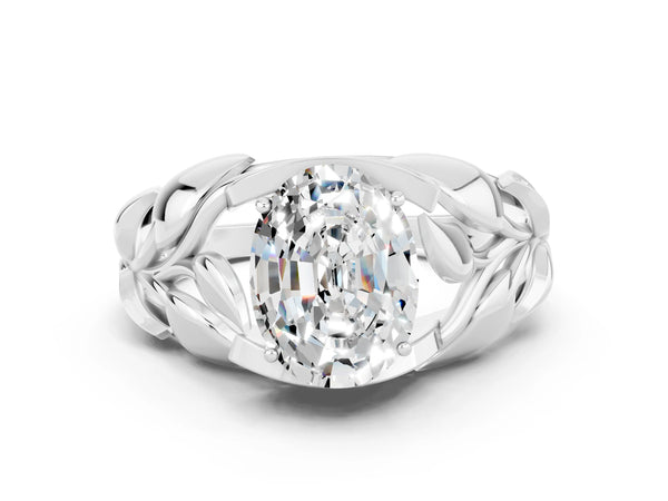 Silver Oval Cut Moissanite Leaf-Inspired Engagement Ring with Round Accents and Prong Setting