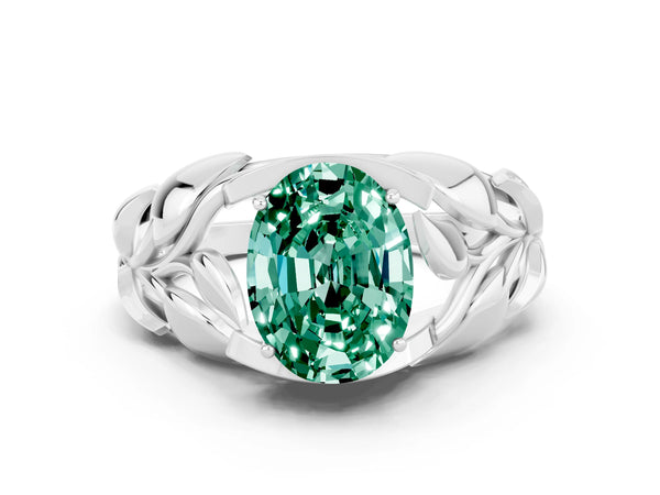 White gold Oval Cut Green Sapphire Leaf-Inspired Engagement Ring with Round Accents and Prong Setting