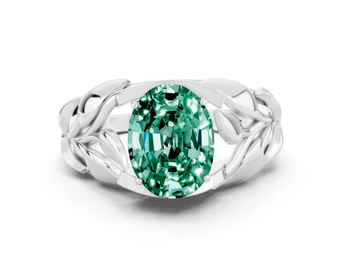 White gold Oval Cut Solitaire Leaf-Inspired Engagement Ring with Prong Setting