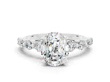 White gold Oval Cut Solitaire Moissanite Ring with Pave Band and Four-Prong Setting